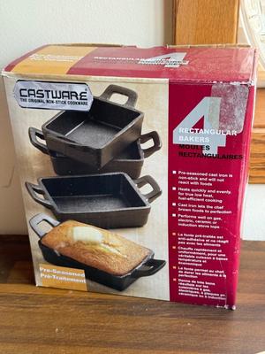 LOT 233: Baking Collection: Mini Cast Iron Loaf Pans in Box, Pie & Tart Pans, Pyrex Glass Dishes, Cake Plate w/ Metal Cloche & More