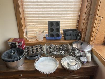 LOT 233: Baking Collection: Mini Cast Iron Loaf Pans in Box, Pie & Tart Pans, Pyrex Glass Dishes, Cake Plate w/ Metal Cloche & More