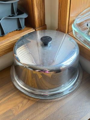 LOT 233: Baking Collection: Mini Cast Iron Loaf Pans in Box, Pie & Tart Pans, Pyrex Glass Dishes, Cake Plate w/ Metal Cloche & More