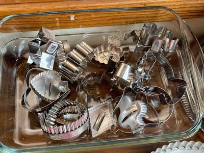 LOT 233: Baking Collection: Mini Cast Iron Loaf Pans in Box, Pie & Tart Pans, Pyrex Glass Dishes, Cake Plate w/ Metal Cloche & More