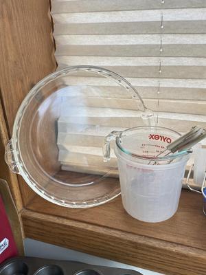 LOT 233: Baking Collection: Mini Cast Iron Loaf Pans in Box, Pie & Tart Pans, Pyrex Glass Dishes, Cake Plate w/ Metal Cloche & More