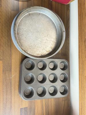LOT 233: Baking Collection: Mini Cast Iron Loaf Pans in Box, Pie & Tart Pans, Pyrex Glass Dishes, Cake Plate w/ Metal Cloche & More