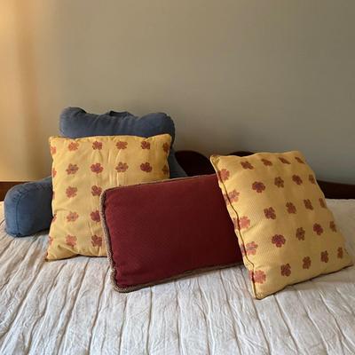 M955 Pillow Lot with Two Floral Pillows and Blue Bolster Pillow