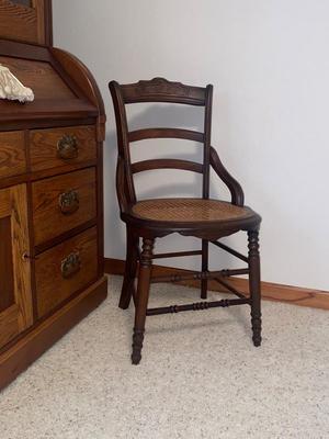 ANTIQUE SECRETARY W/SKELETON KEY LOCK AND ANTIQUE CHAIR WITH A CANE SEAT