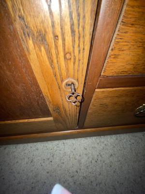 ANTIQUE SECRETARY W/SKELETON KEY LOCK AND ANTIQUE CHAIR WITH A CANE SEAT