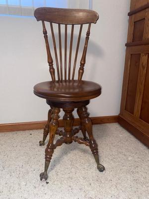 ANTIQUE SWIVEL PIANO STOOL WITH GLASS BALL BRASS CLAW FEET