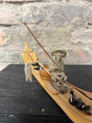 Happy fishermen - mud man