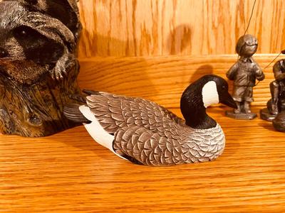 STUMP DWELLER RACCOONS BY GARY STEVENSON AND CANADIAN GOOSE BY HERITAGE DECOYS
