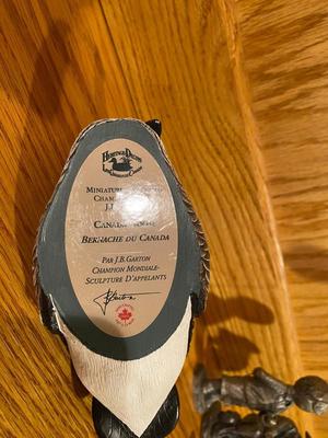 STUMP DWELLER RACCOONS BY GARY STEVENSON AND CANADIAN GOOSE BY HERITAGE DECOYS