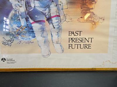 Commitment to Excellence poster and The day We Walked On The Moon paperback book