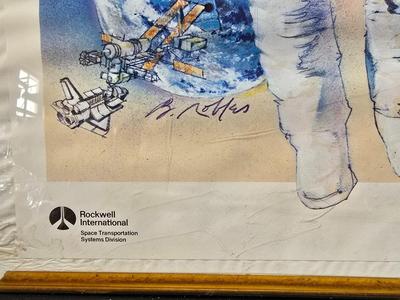 Commitment to Excellence poster and The day We Walked On The Moon paperback book