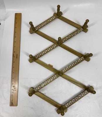Vintage Wood Accordion Peg Rack, painted gold with white flower accent