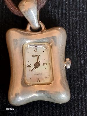 Boma .925 sterling silver marked Watch pendant with a pair of earrings marked Isreal