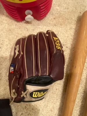 BASEBALL BATS, WILSON GLOVE, ROCKIES SHIRTS AND BEVERAGE COOLERS
