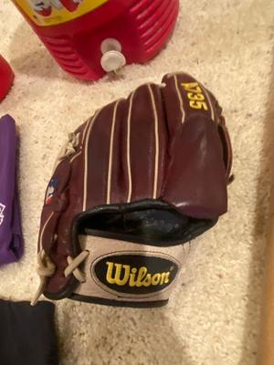 BASEBALL BATS, WILSON GLOVE, ROCKIES SHIRTS AND BEVERAGE COOLERS