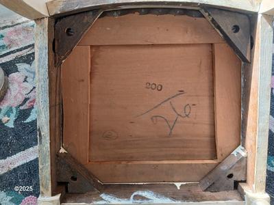 Antique highback diningroom chair with a brass colored swing arm floor lamp