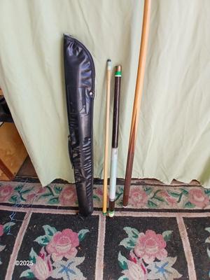 Two vintage pool cues - Sears Roebuck # 40848 48" cue & an older unmarked two-piece cue with case