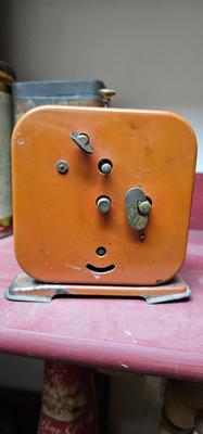 Vintage Orange Medalist Clock