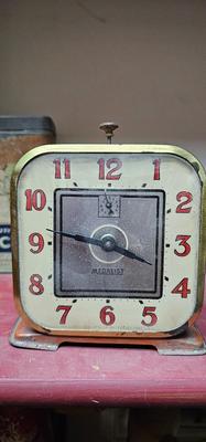 Vintage Orange Medalist Clock