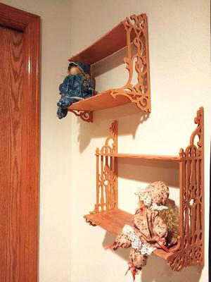 TWO HAND CARVED WALL SHELVING