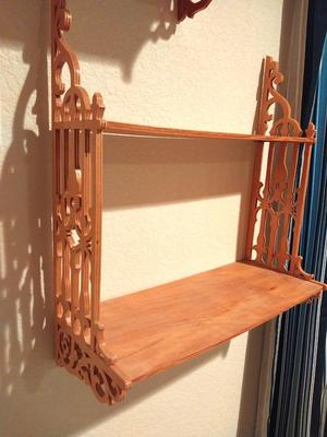 TWO HAND CARVED WALL SHELVING