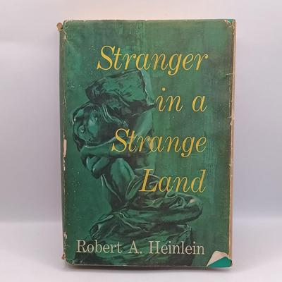 LOT 20: Ray Bradbury's 1953 Fahrenheit 451, Heinlein's 1961 Stranger in a Strange Land, Pratchett's 1981 Strata & More