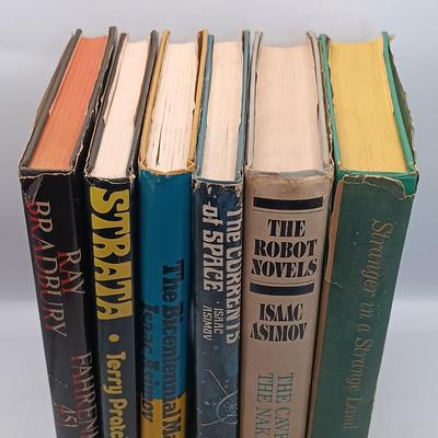 LOT 20: Ray Bradbury's 1953 Fahrenheit 451, Heinlein's 1961 Stranger in a Strange Land, Pratchett's 1981 Strata & More