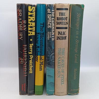 LOT 20: Ray Bradbury's 1953 Fahrenheit 451, Heinlein's 1961 Stranger in a Strange Land, Pratchett's 1981 Strata & More