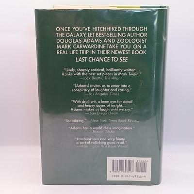 LOT 24: Doctor Who 1983 Two Decades Through Time and Space, Douglas Adam's 1979 Hitchhiker's Guide to the Galaxy & More