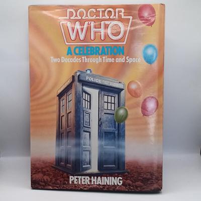 LOT 24: Doctor Who 1983 Two Decades Through Time and Space, Douglas Adam's 1979 Hitchhiker's Guide to the Galaxy & More