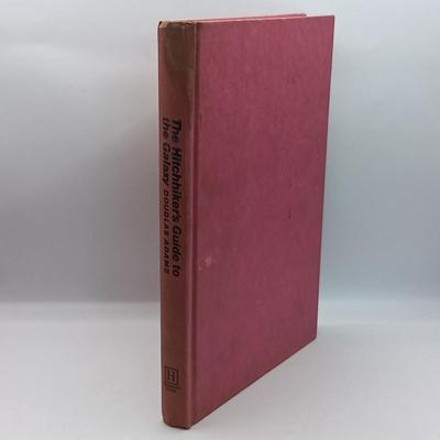 LOT 24: Doctor Who 1983 Two Decades Through Time and Space, Douglas Adam's 1979 Hitchhiker's Guide to the Galaxy & More