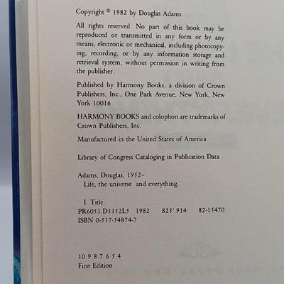 LOT 24: Doctor Who 1983 Two Decades Through Time and Space, Douglas Adam's 1979 Hitchhiker's Guide to the Galaxy & More