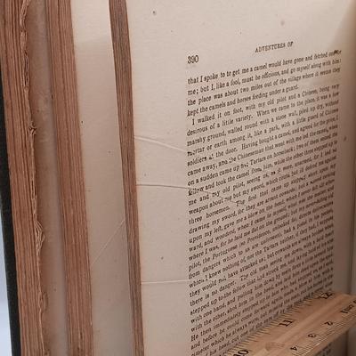 LOT 25: Jules Verne's 1874 From the Earth to the Moon with 1864 Life and Surprising Adventures of Robinson Crusoe