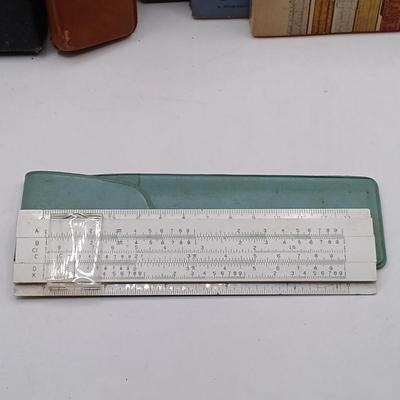 LOT 192: Vintage Charvos Drafting Set, Slide Rulers & Books