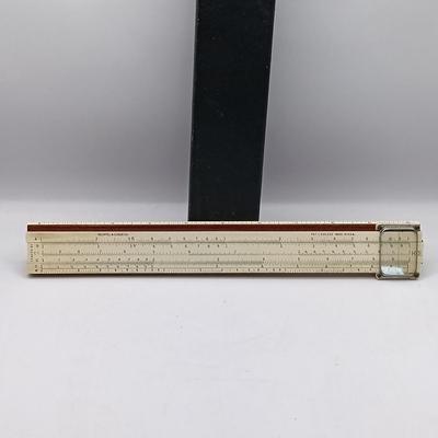 LOT 192: Vintage Charvos Drafting Set, Slide Rulers & Books