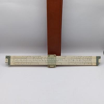 LOT 192: Vintage Charvos Drafting Set, Slide Rulers & Books