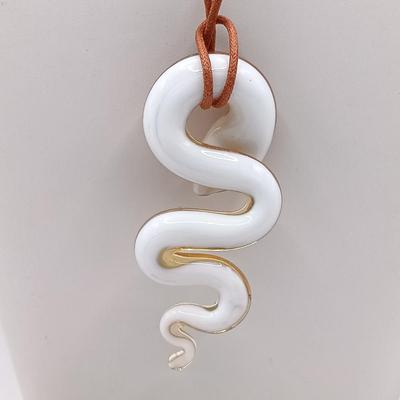 LOT 210: New in Box Venetiaurium Murano Glass Snake Pendant Necklace and a NIB Carved Bone Hair Stick
