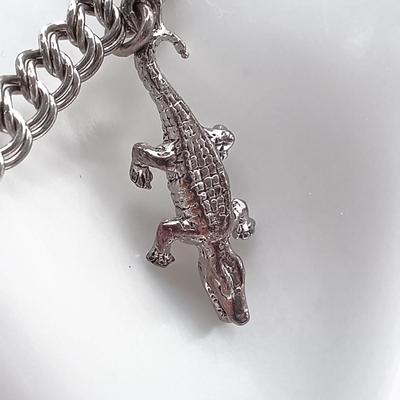 LOT 211: Vintage Sterling Charm Bracelet 14.7g