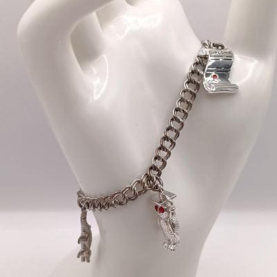 LOT 211: Vintage Sterling Charm Bracelet 14.7g