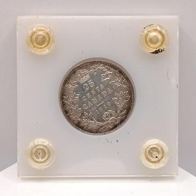 LOT 221: Royal Canadian Mint 1985 Silver Dollar, 1919 Canadian Quarter & 1963 and 1967 UK Pennies