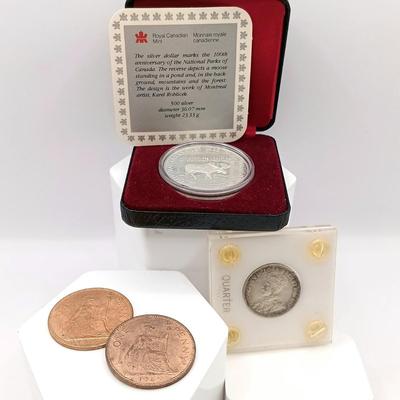 LOT 221: Royal Canadian Mint 1985 Silver Dollar, 1919 Canadian Quarter & 1963 and 1967 UK Pennies