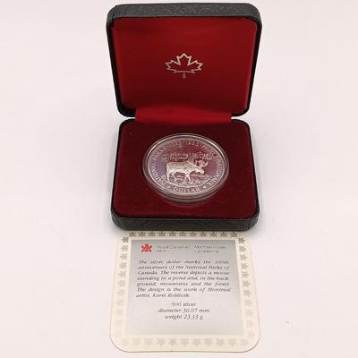 LOT 221: Royal Canadian Mint 1985 Silver Dollar, 1919 Canadian Quarter & 1963 and 1967 UK Pennies