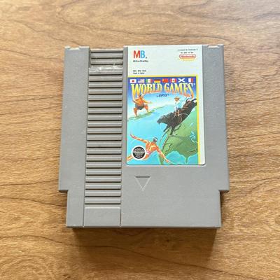 LOT 105F: 1980s-90s Tengen RBI Baseball 3 & NES Game Cartridges: Nintendo World Cup, Milton Bradley World Games by Epyx, Jaleco...