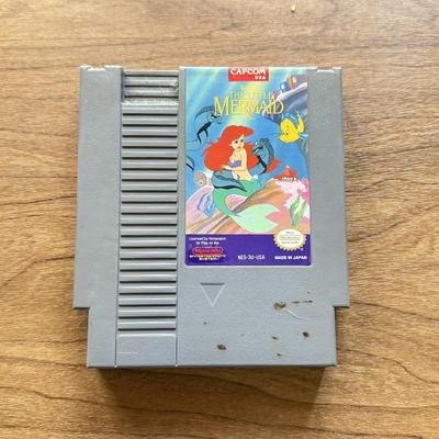 LOT 108F: 1980s-90s NES Game Cartridges: Wheel of Fortune, Millipede, Teenage Mutant Ninja Turtles, Kickle Cubicle, Disney's The...