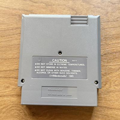 LOT 108F: 1980s-90s NES Game Cartridges: Wheel of Fortune, Millipede, Teenage Mutant Ninja Turtles, Kickle Cubicle, Disney's The...
