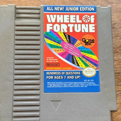 LOT 108F: 1980s-90s NES Game Cartridges: Wheel of Fortune, Millipede, Teenage Mutant Ninja Turtles, Kickle Cubicle, Disney's The...