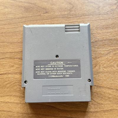 LOT 108F: 1980s-90s NES Game Cartridges: Wheel of Fortune, Millipede, Teenage Mutant Ninja Turtles, Kickle Cubicle, Disney's The...