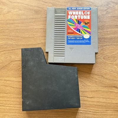 LOT 108F: 1980s-90s NES Game Cartridges: Wheel of Fortune, Millipede, Teenage Mutant Ninja Turtles, Kickle Cubicle, Disney's The...