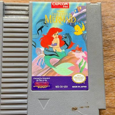 LOT 108F: 1980s-90s NES Game Cartridges: Wheel of Fortune, Millipede, Teenage Mutant Ninja Turtles, Kickle Cubicle, Disney's The...