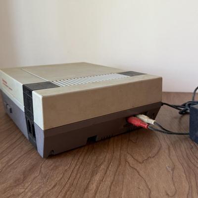 LOT 114F: Nintendo NES Control Deck Model NES-001 w/ 3 Model NES-004 Controllers & Nintendo 64 Control Deck NVS-001